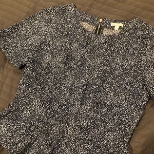 Blue and white dotted peplum top